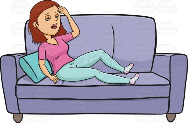 Woman lying on a sofa looking sick